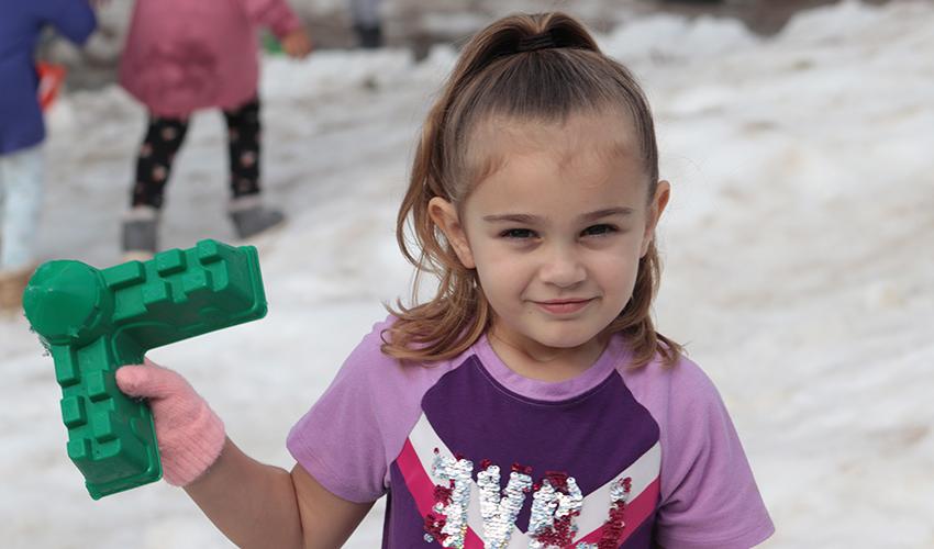 Little girl looking at the camera